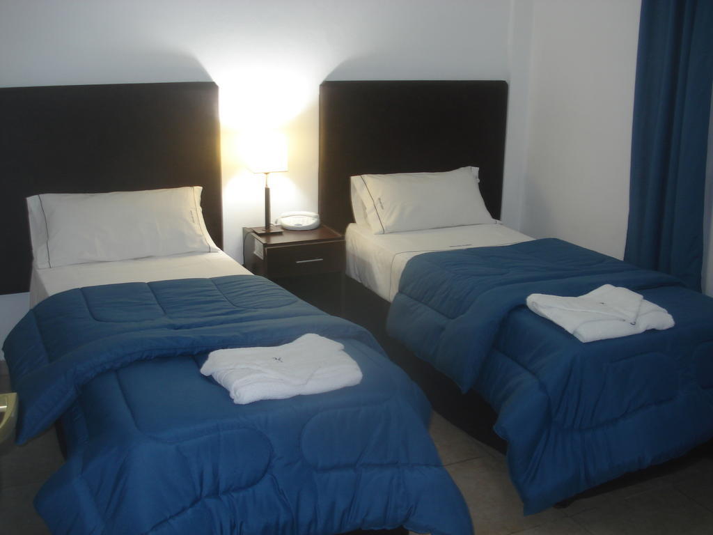 Morada Suites Campana Pokoj fotografie
